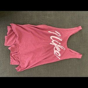 Rose color running tank.